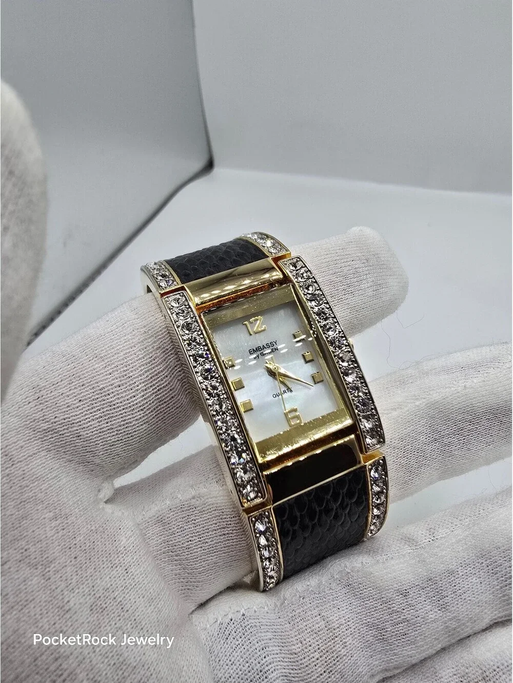 Embassy by Gruen Women’s Quartz Rectangle Analog White Dial Gold Black Bangle